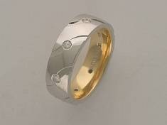 Обручальные кольца из трубы из комбинированного золота c бриллиантом Г5К662046