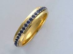 Обручальные кольца крутящиеся из комбинированного золота c рубином 65о560001